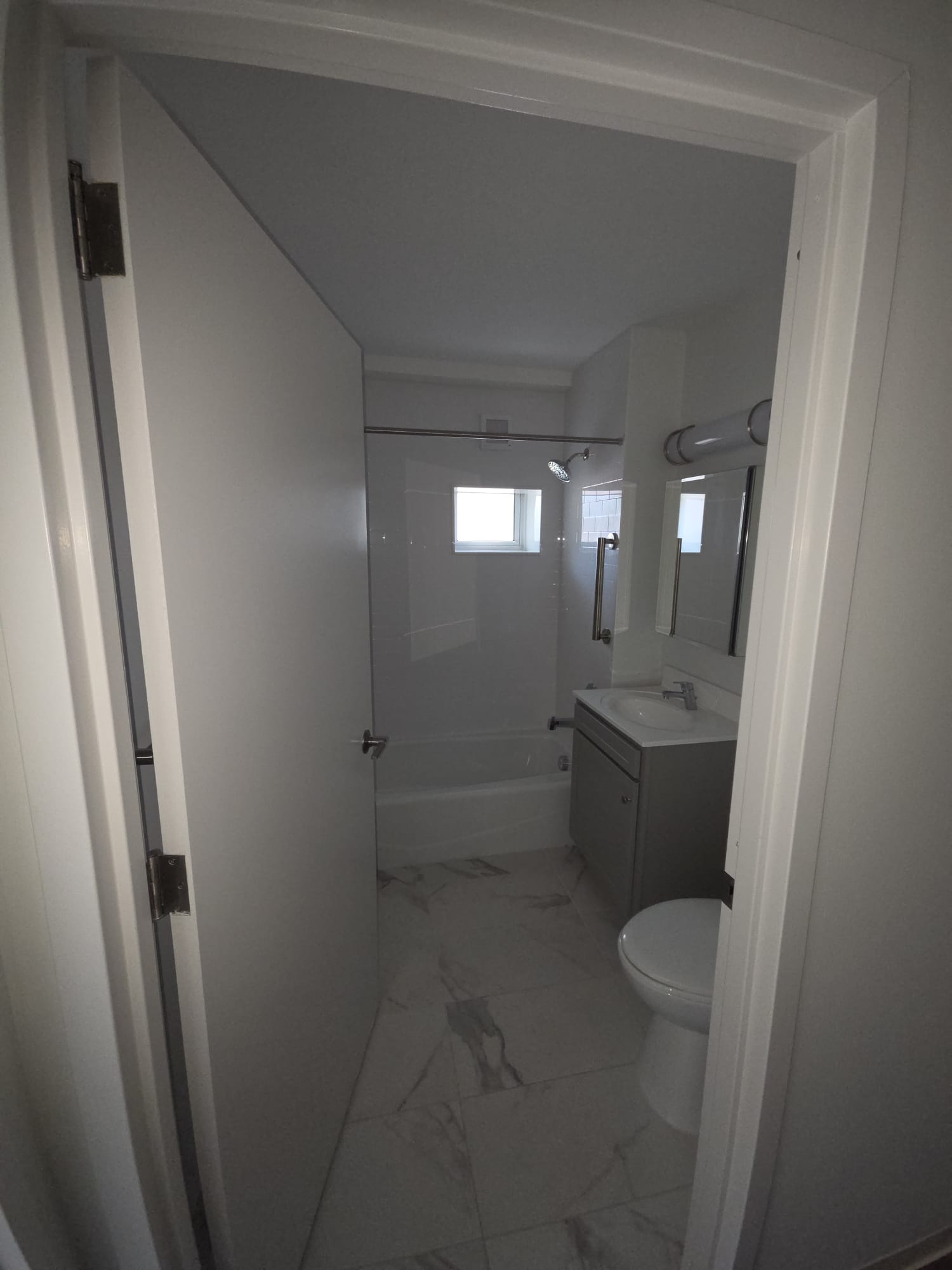 Finished bathroom renovation after full interior remodeling.